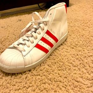Size 9.5,Red and white adidas Sneekers